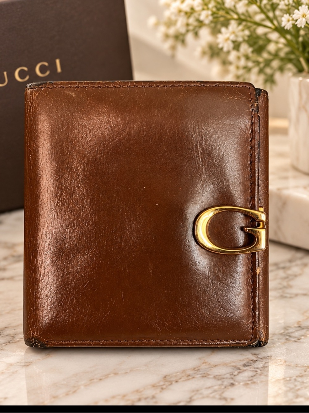 Gucci bi fold leather wallet